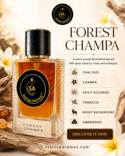 Product display for Forest Champa perfume by Startup Aromas. A clear fluted glass bottle filled with rich amber fragrance sits on raw driftwood surrounded by golden amber resins and white champa flowers against a soft cream background.
